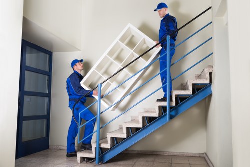 Customer discussing a moving quotation with a removals team