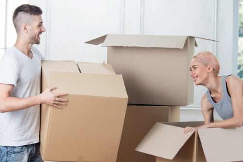 Packed household items prepared for transport by a removals service