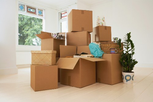 A Barnet removals team loading furniture into a moving van