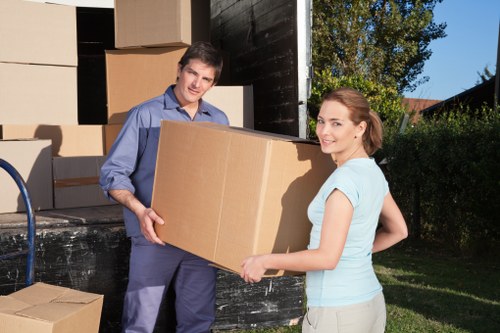 Man and van loading furniture for a local move